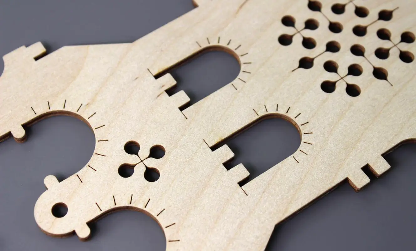 CO2 laser cutting machine cutting and engraving wood with precision and clean edges