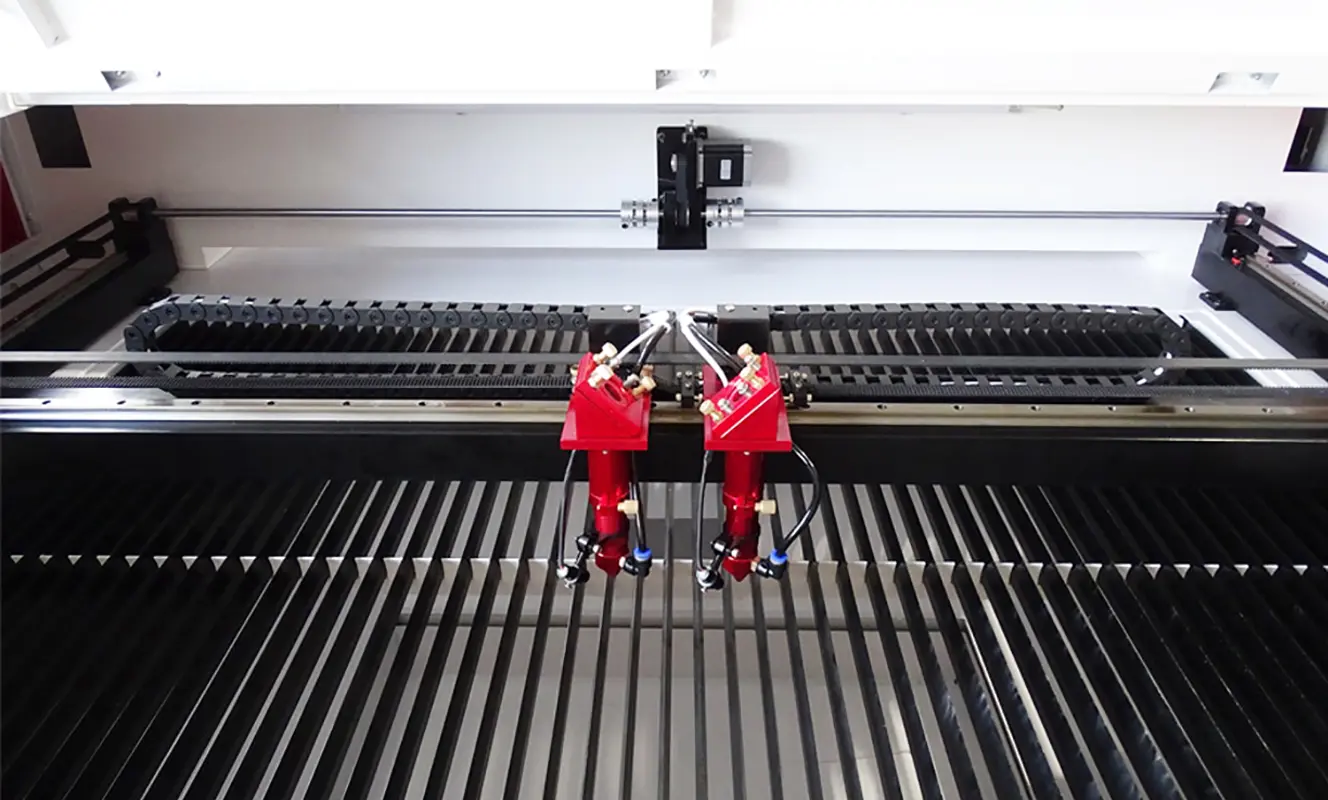 Dual-station CO2 laser cutting machine designed for efficient material processing and continuous production
