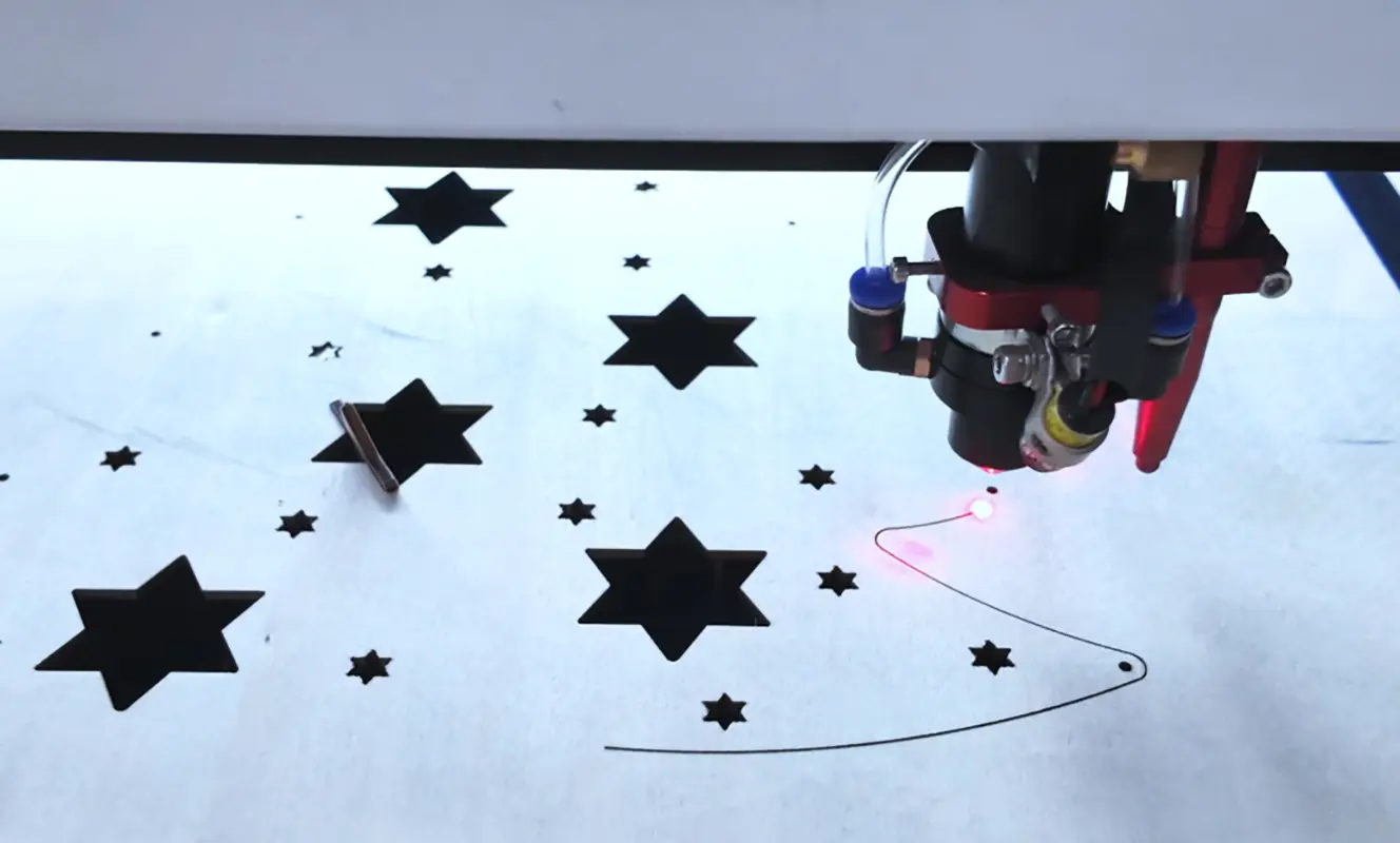 CO2 laser cutting machine working principle showing a focused infrared laser beam processing material