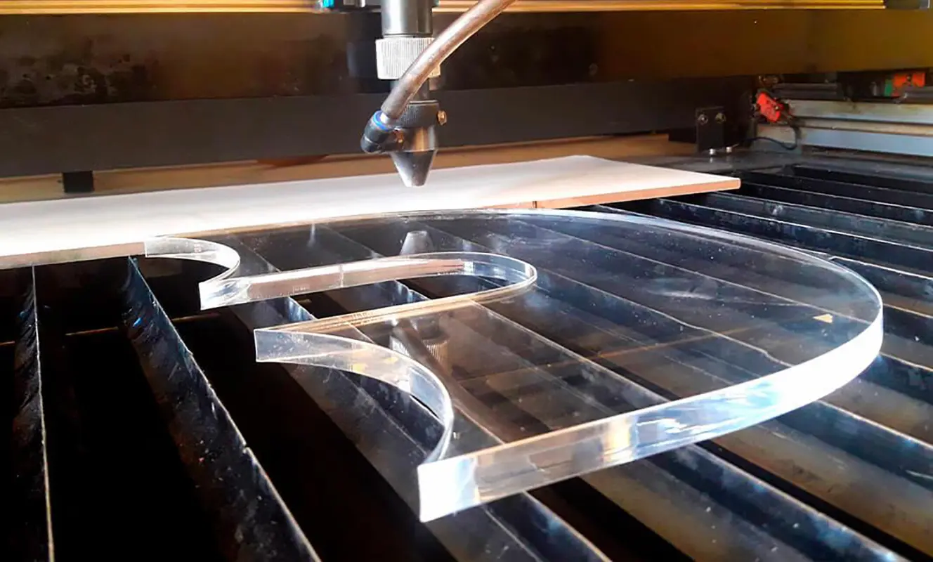 CO2 laser cutting machine cutting acrylic sheets with smooth edges and precise details