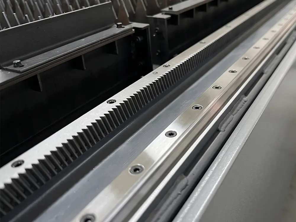 Linear guide rails and racks Linear guide rails and racks of the fiber laser sheet and tube cutting machine with shuttle table