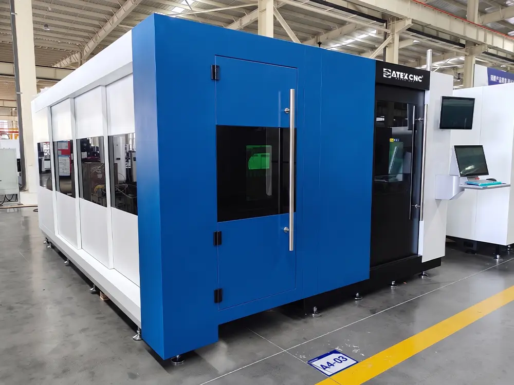 Right front view of the fiber laser sheet and tube cutting machine with shuttle table Right front view of the fiber laser sheet and tube cutting machine with shuttle table