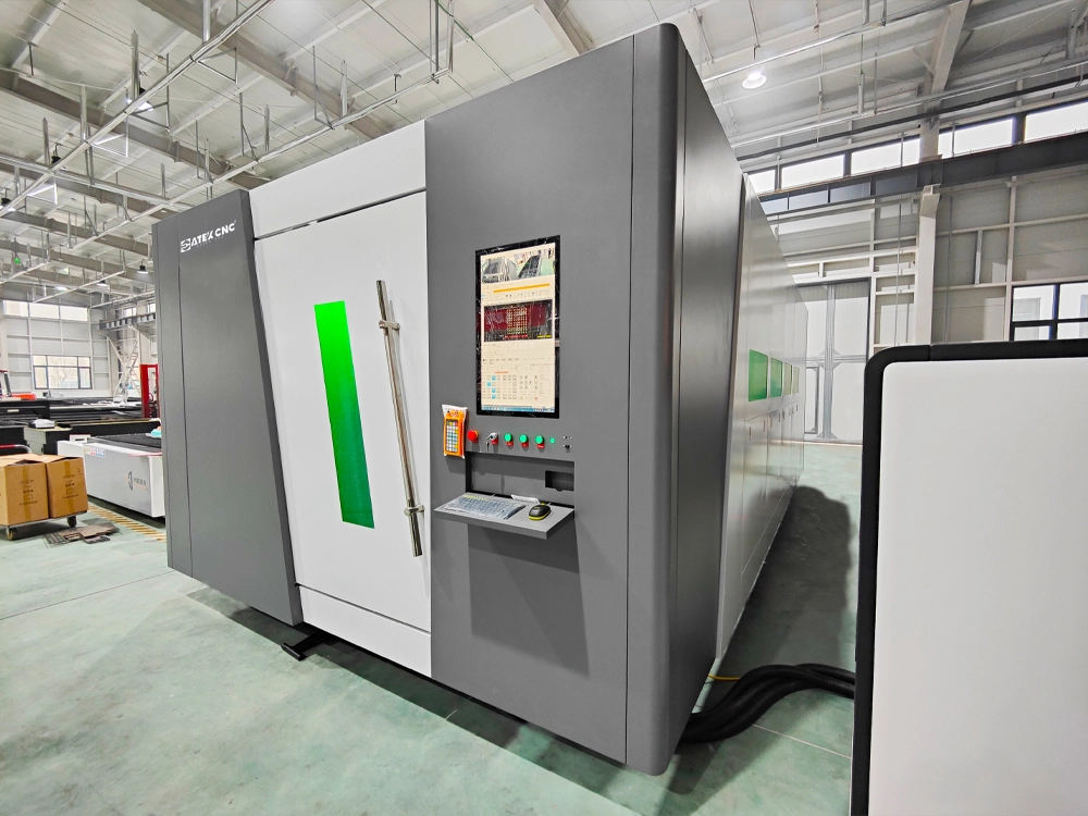 Front left view of the 2040 enclosed fiber laser cutting machine with dual-shuttle table Front left view of the 2040 enclosed fiber laser cutting machine with dual-shuttle table