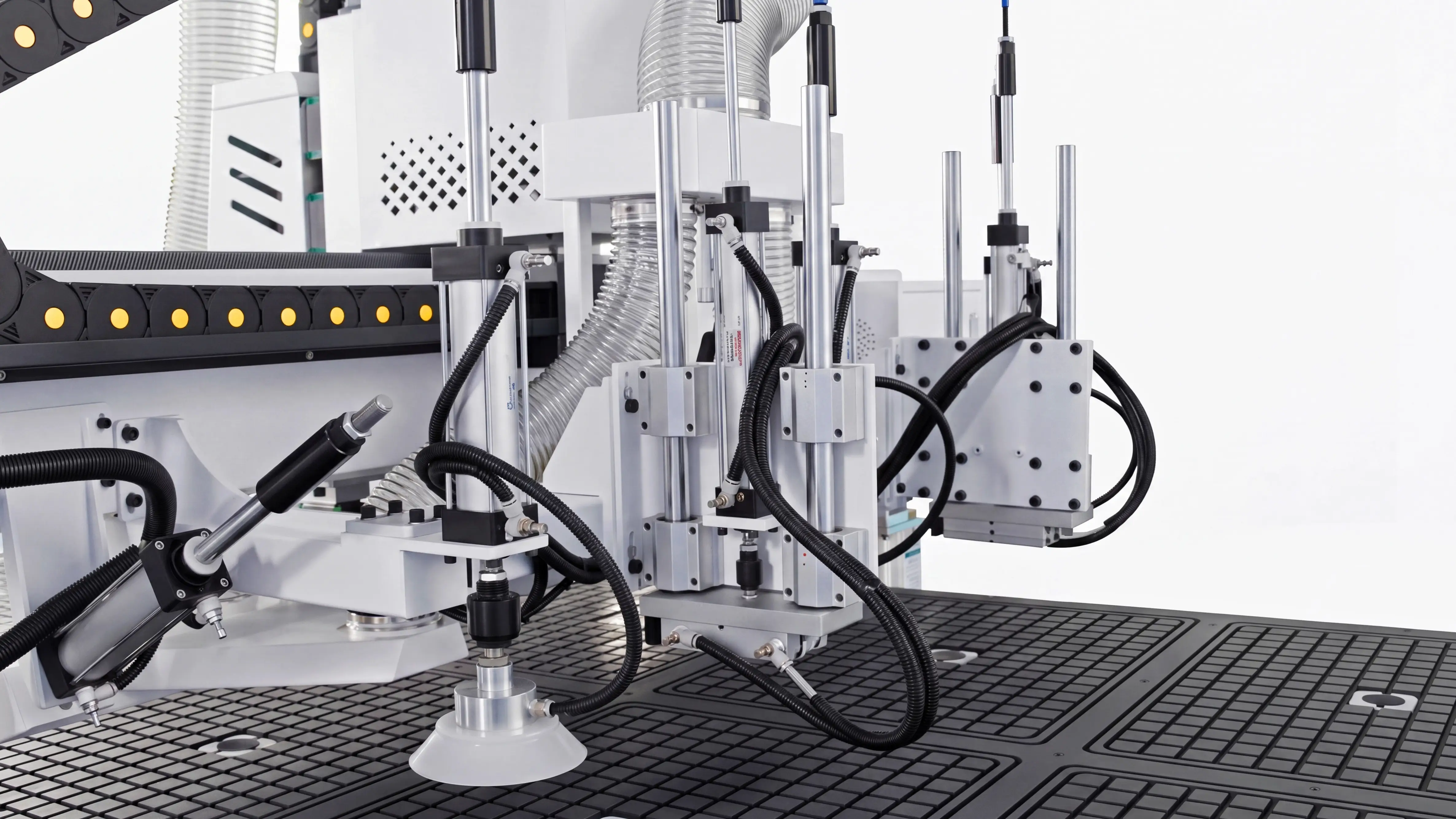 Vacuum loading suction cups worktable of Spire 1530 CNC nesting machine