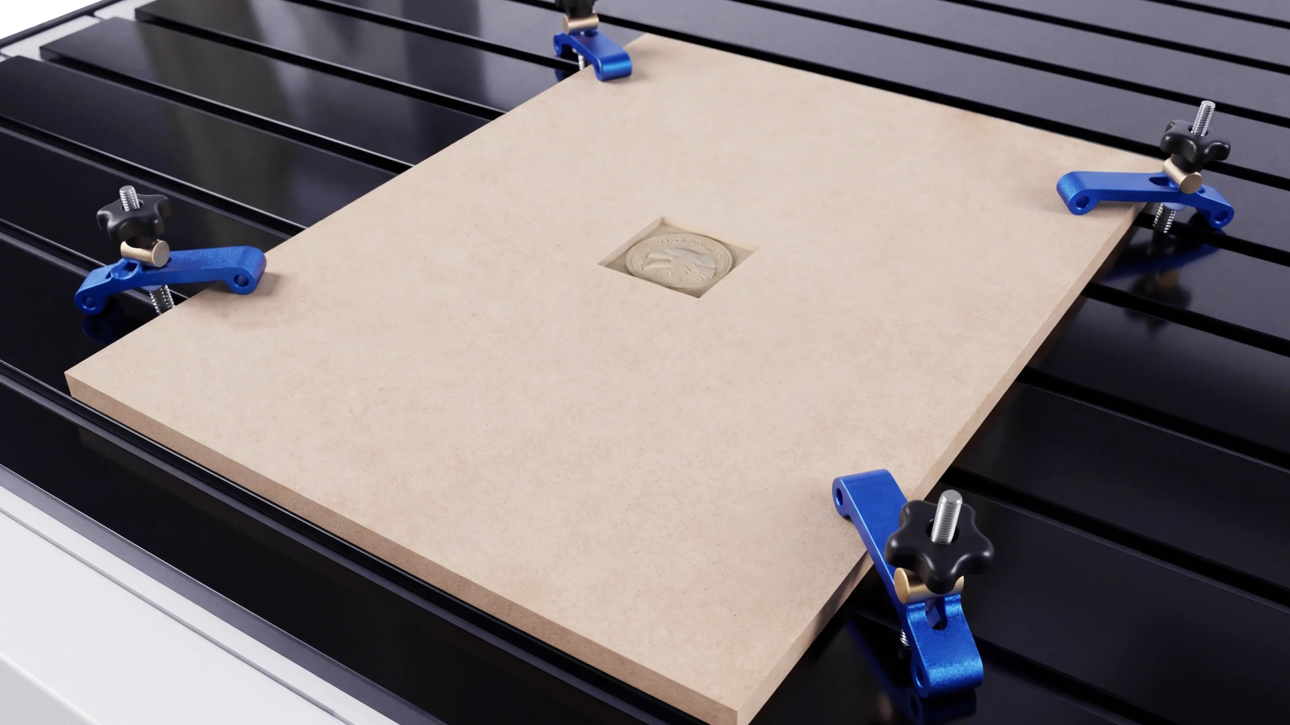 Hold-down clamps for Spire 1325 CNC router