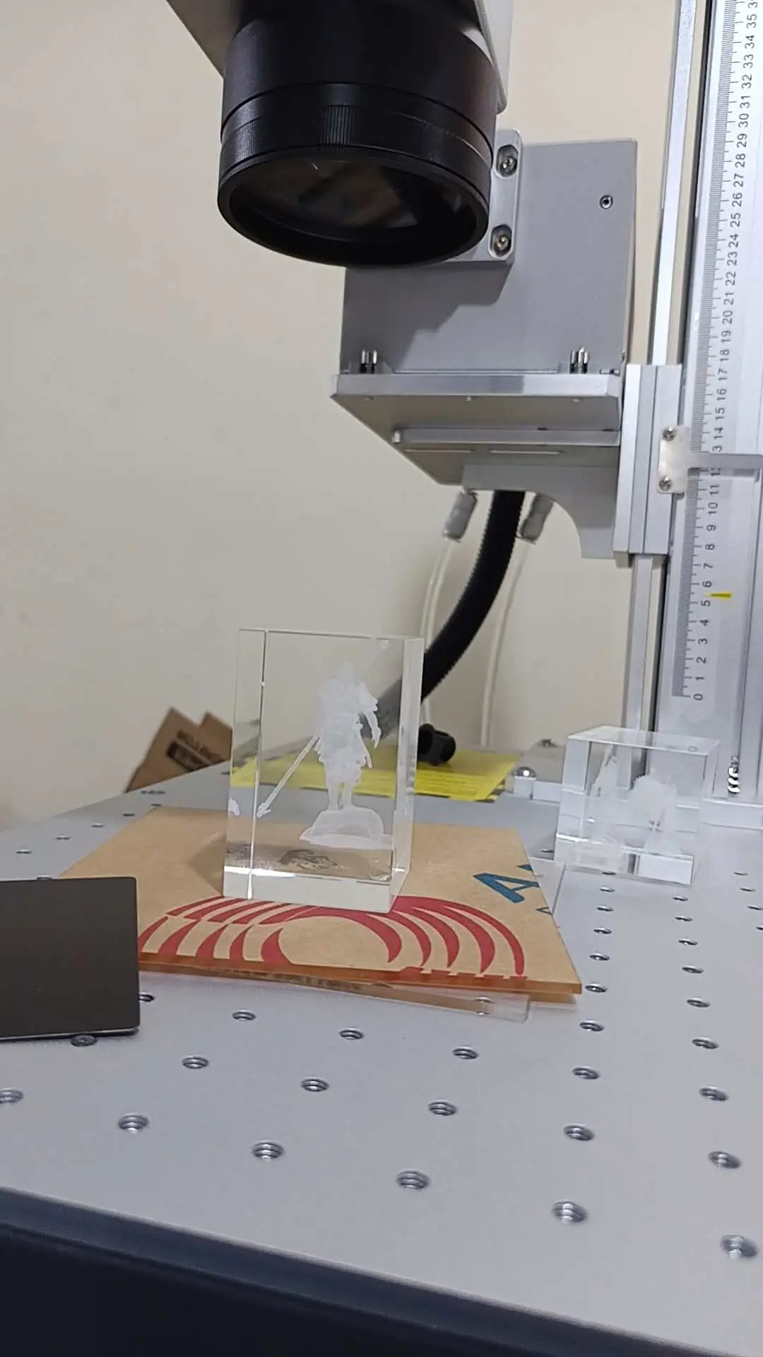 The Tanzanian customers are using UV laser marking machines to mark glass and pens