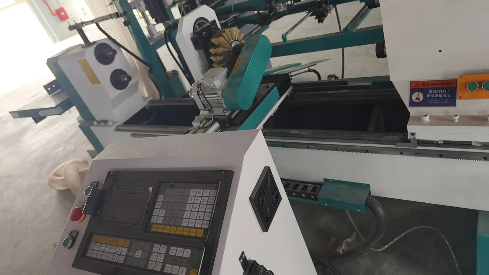 The CNC woodw lathe with automatic loading and unloading system purchased by a Vietnamese customer