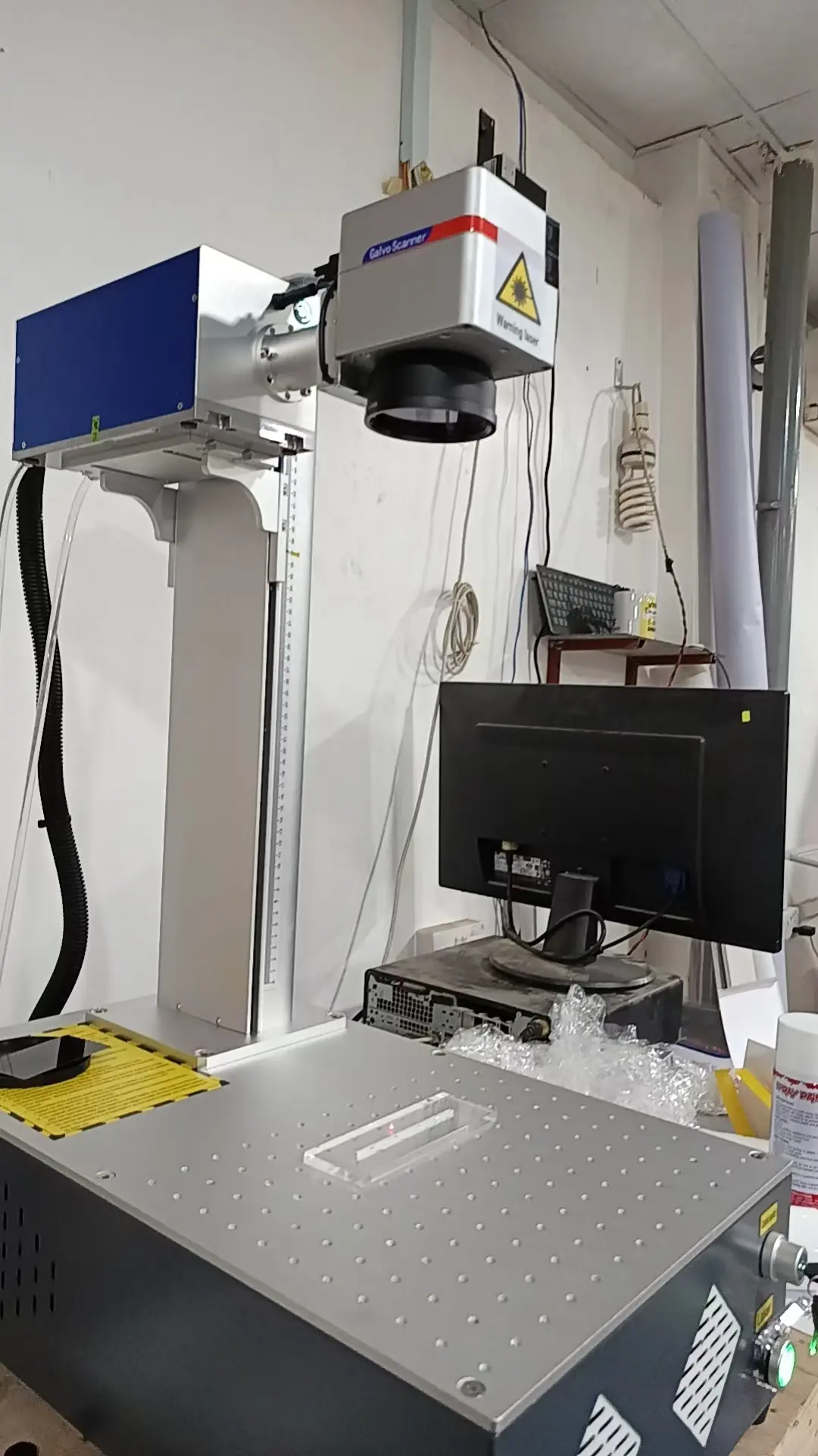 The Tanzanian customers are using UV laser marking machines to mark glass and pens