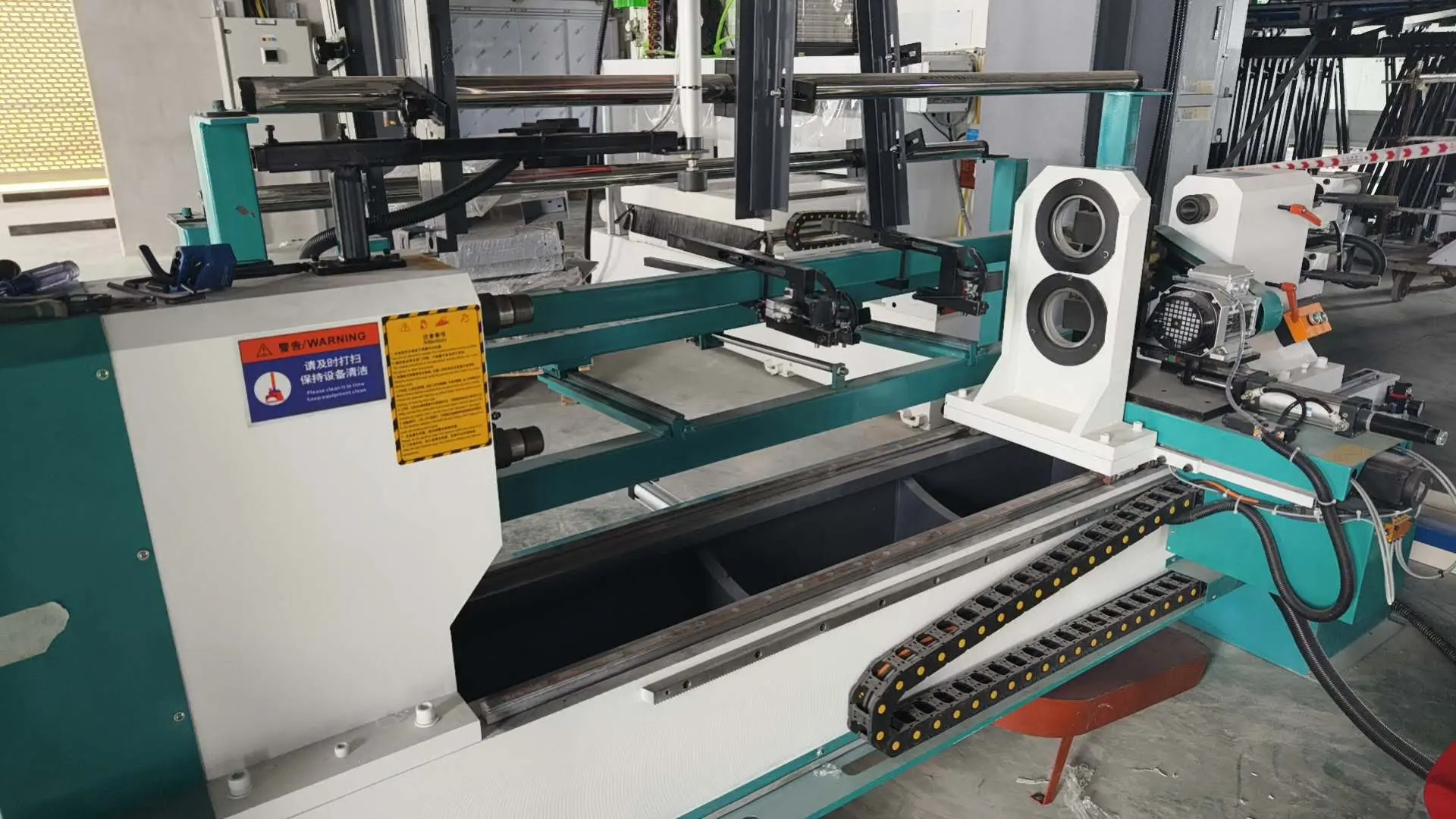 The CNC woodw lathe with automatic loading and unloading system purchased by a Vietnamese customer