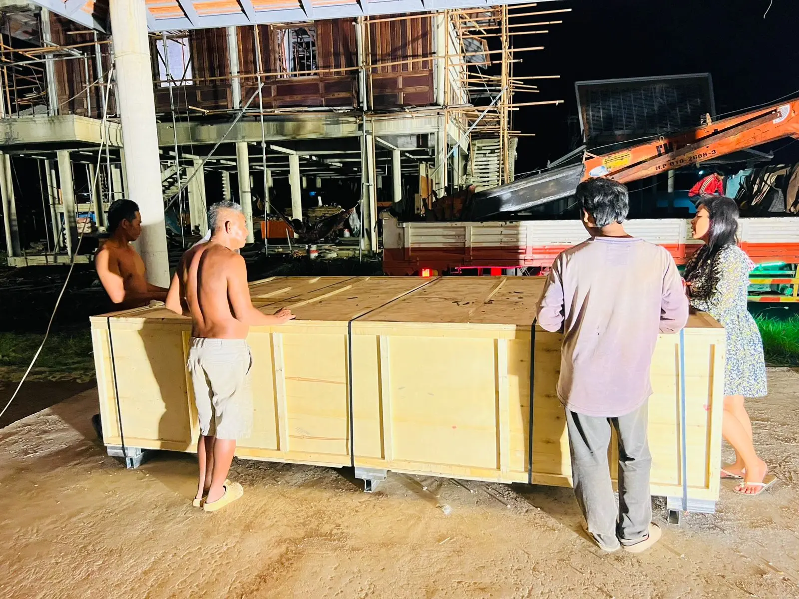 The Cambodian customer is assembling and testing a CNC wood router machine with a 4th-rotary axis.