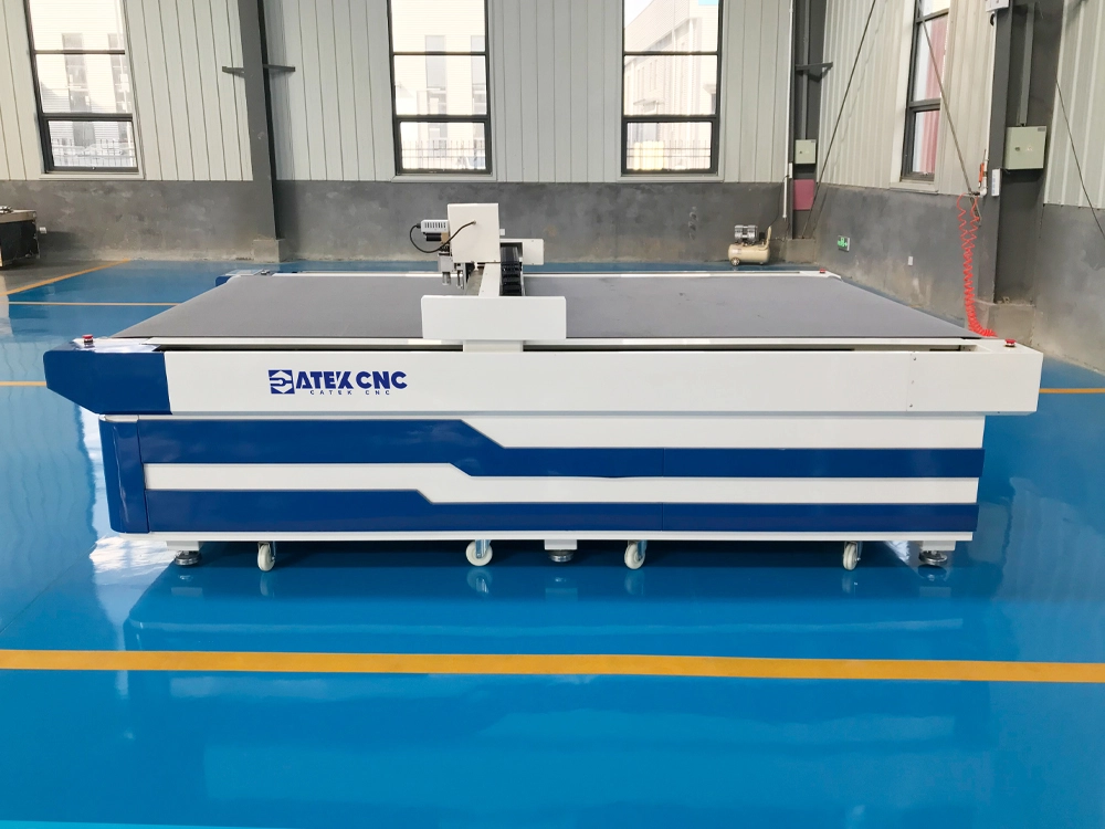 Left side view of CNC oscillating knife cutting machine Left side view of CNC oscillating knife cutting machine
