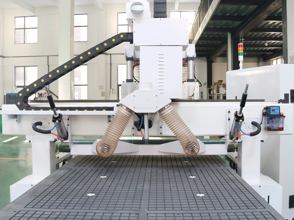 Rear view of CNC router with four switchable spindle Rear view of CNC router with four switchable spindle