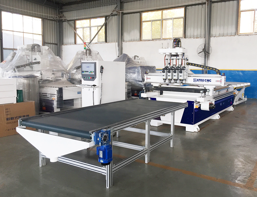 Front left view of 4*8 CNC router with four switching function and automatic loading & unloading platform Front left view of 4*8 CNC router with four switching function and automatic loading & unloading platform