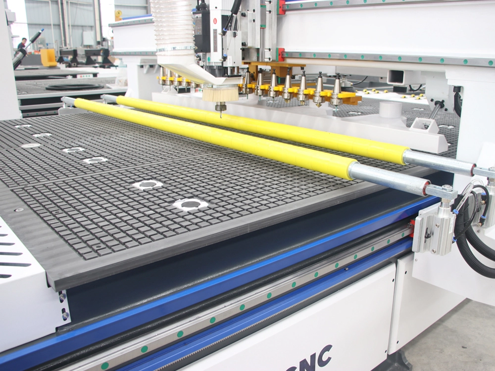 Double rod pneumatic pressure roller for 7x10ft ATC CNC router with automatic loading and unloading Double rod pneumatic pressure roller for 7x10ft ATC CNC router with automatic loading and unloading