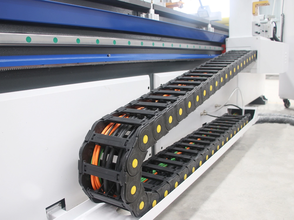 Drag chains of 7x10ft ATC CNC router with automatic loading and unloading Drag chains of 7x10ft ATC CNC router with automatic loading and unloading