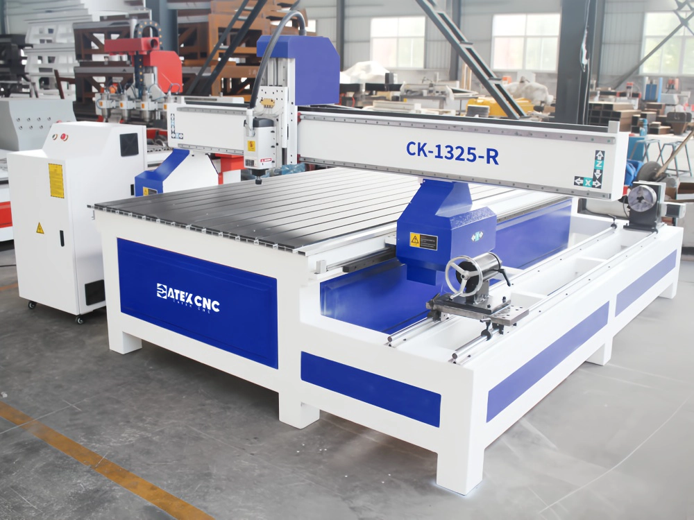 Front left view of 4x8 CNC router with rotary fourth axis Front left view of 4x8 CNC router with rotary fourth axis