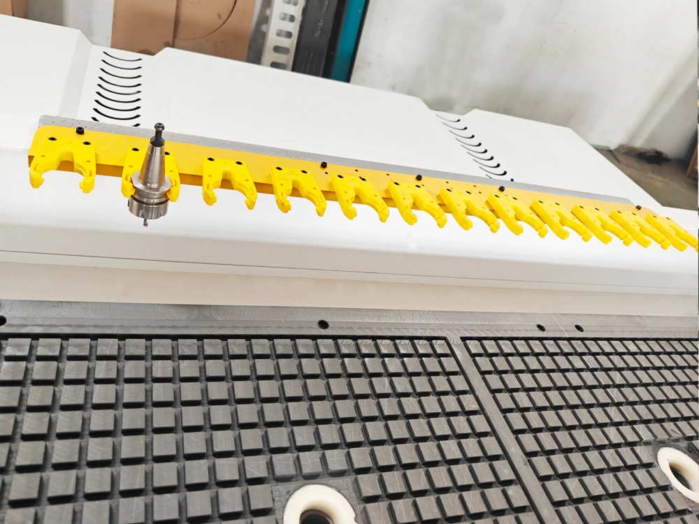 Linear tool changer for 7'x10' four-axis linear ATC CNC router Linear tool changer for 7'x10' four-axis linear ATC CNC router