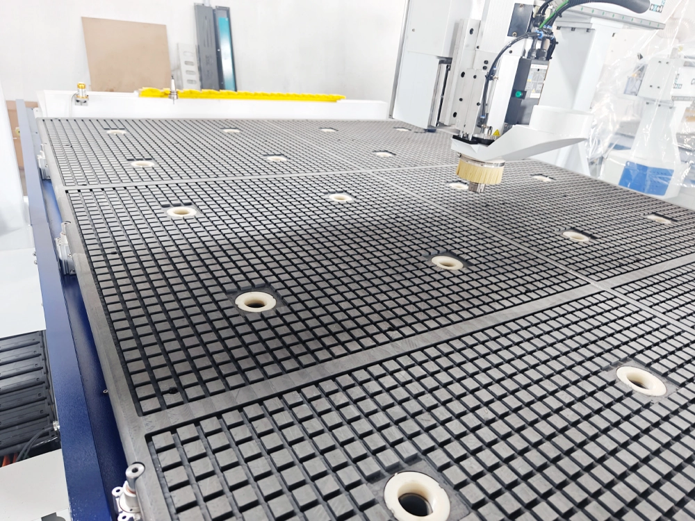 Vacuum suction workbench of 7'x10' four-axis linear ATC CNC router Vacuum suction workbench of 7'x10' four-axis linear ATC CNC router