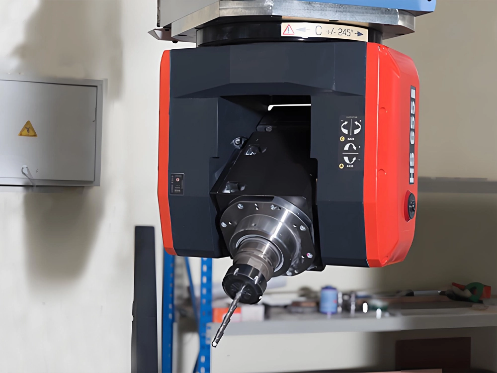 Automatic tool change spindle on the five axis machine head Automatic tool change spindle on the five axis machine head