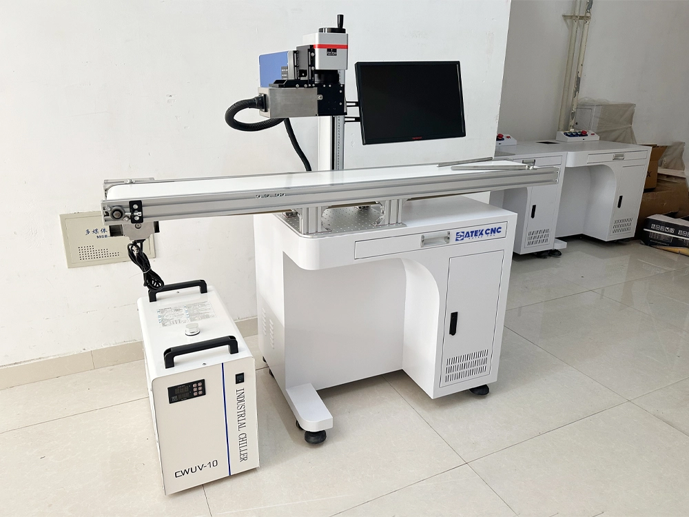Front right view of UV laser marking machine with vision and conveyor Front right view of UV laser marking machine with vision and conveyor