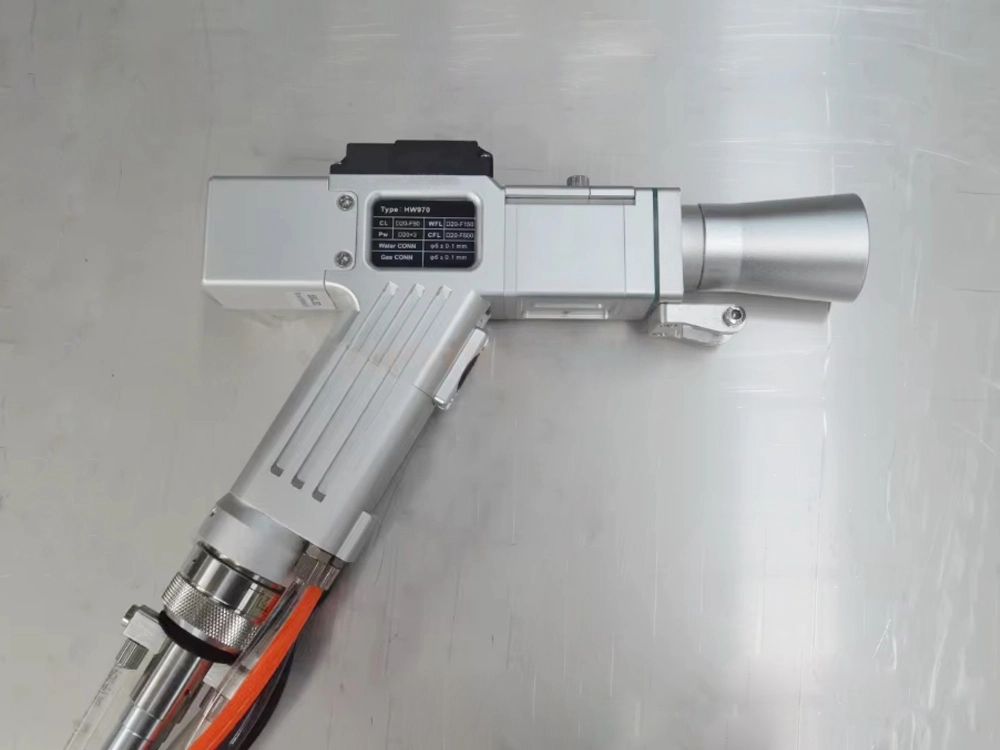 Laser gun with replaced clearing nozzle Laser gun with replaced clearing nozzle