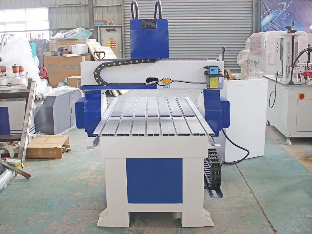 Back view of a mini CNC router with two spindles switching Back view of a mini CNC router with two spindles switching