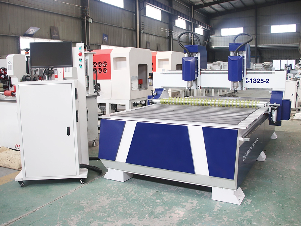 Double head CNC wood router with pneumatic press wheel device Double head CNC wood router with pneumatic press wheel device