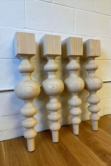 The American customer purchased a three-station CNC wood lathe to process pool table legs