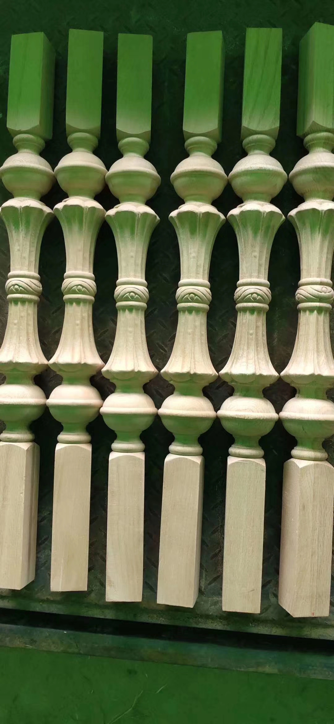 The Spanish customer utilizing multi-spindle CNC wood routers for batch production of stair newels