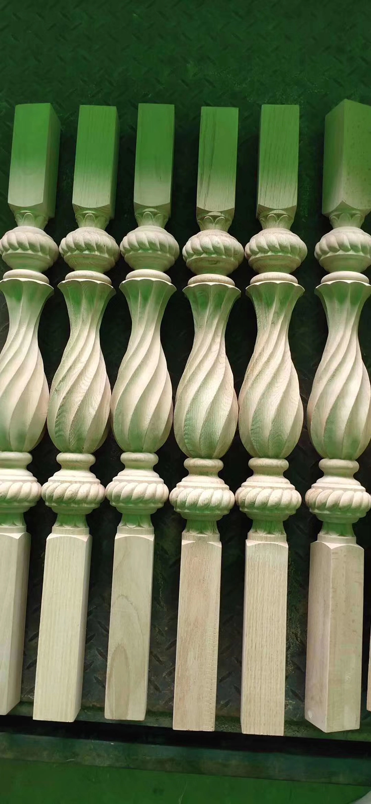 The Spanish customer utilizing multi-spindle CNC wood routers for batch production of stair newels