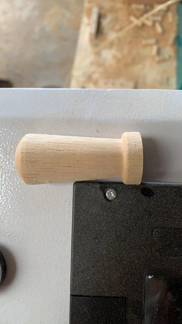 The Chilean customer used an automatic feeding CNC wood lathe to process wooden handles