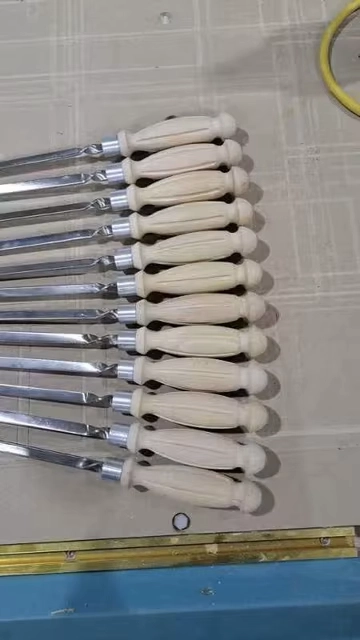 Georgian customers purchased 0615 CNC wood lathe to process barbecue skewer handles