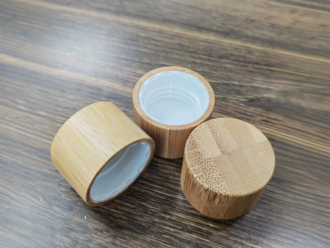 The Czech customers used a small CNC wood lathe with automatic loading and unloading to process wooden caps for perfume bottles