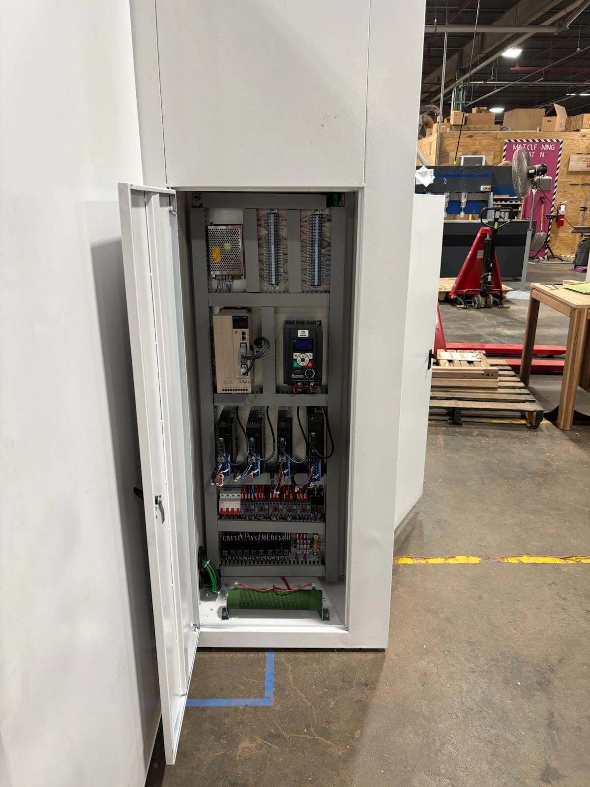 The US customer inspecting the received CNC wood lathe