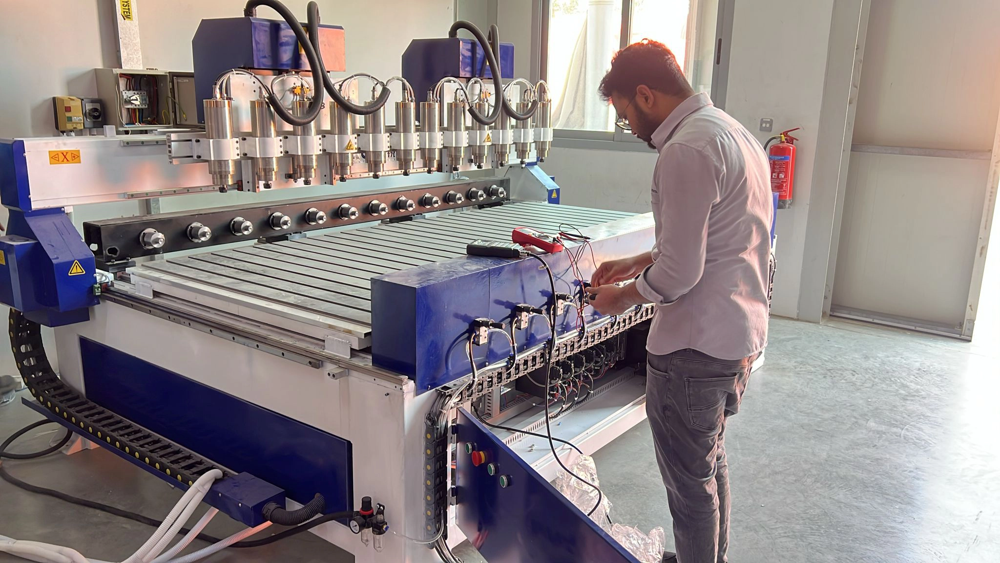 The Saudi Arabian customers purchased multi-station CNC wood 3D router machine