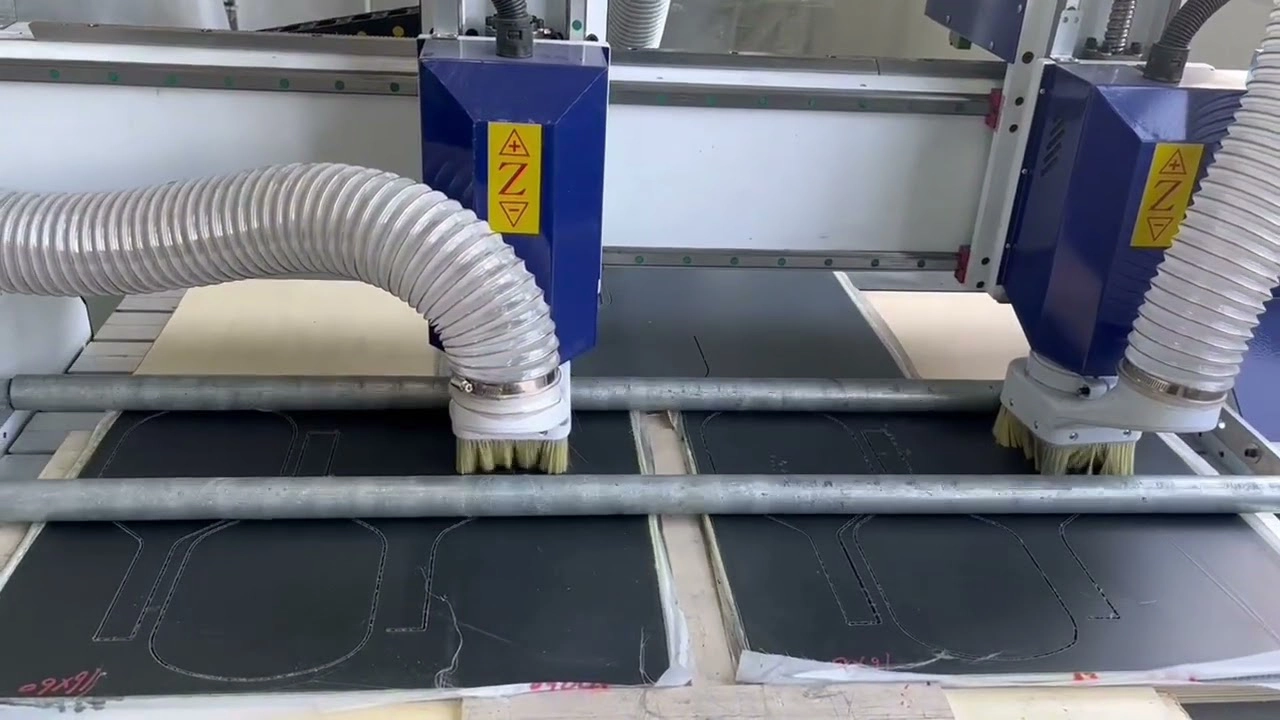 CNC Router With Two Independently Controlled Spindles and Pneumatic Roller